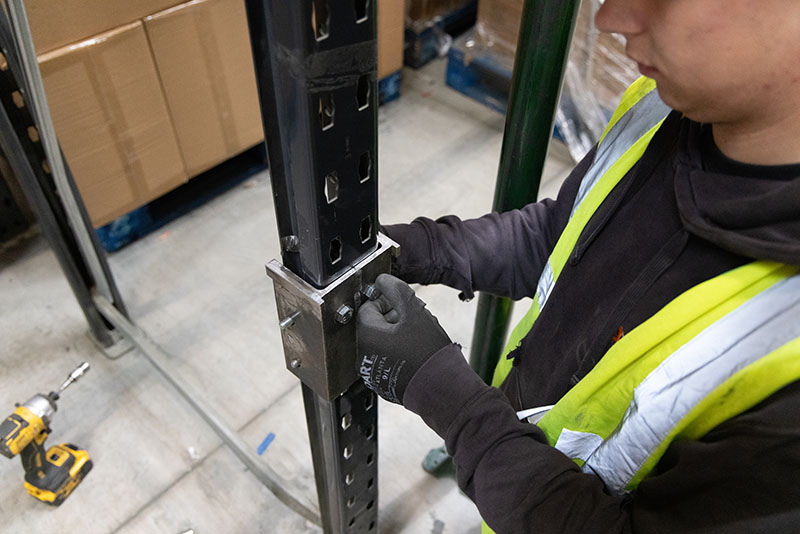 Close up of man installing Goliath