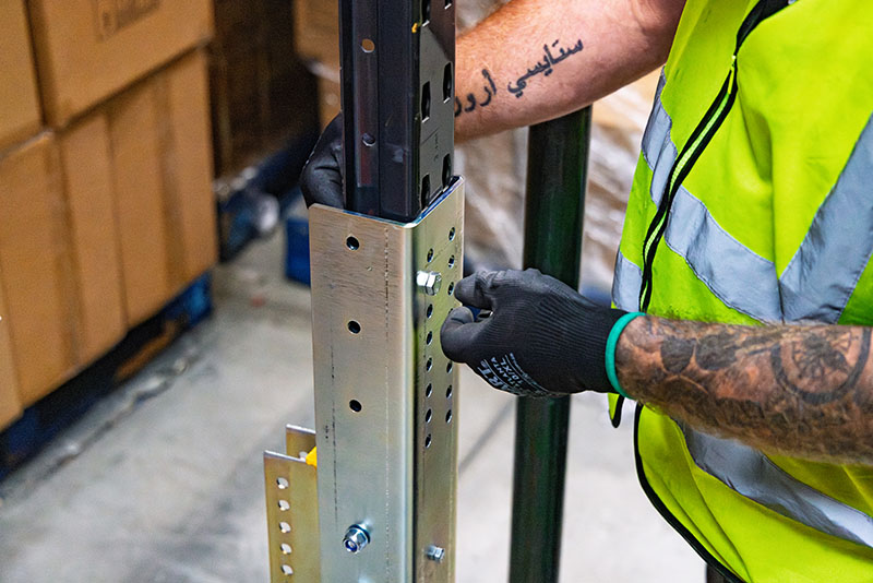 Close up of a man installing Goliath