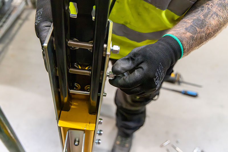 Close up of a man installing Goliath