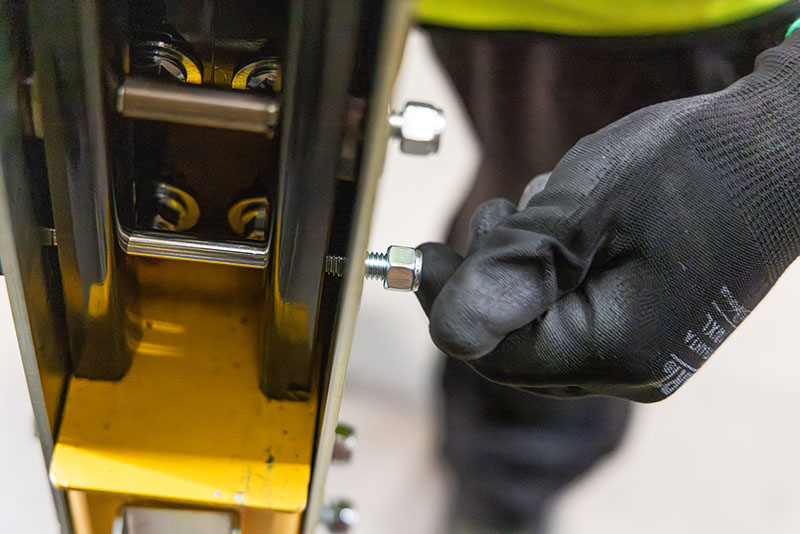 Close up of a man installing Goliath