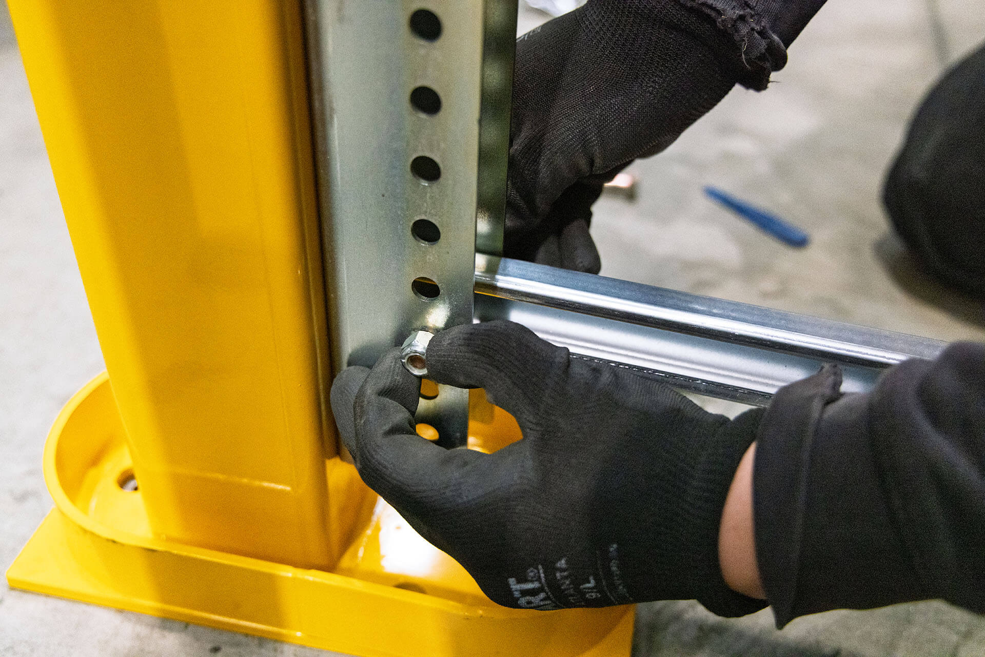 Close up of a man installing Goliath